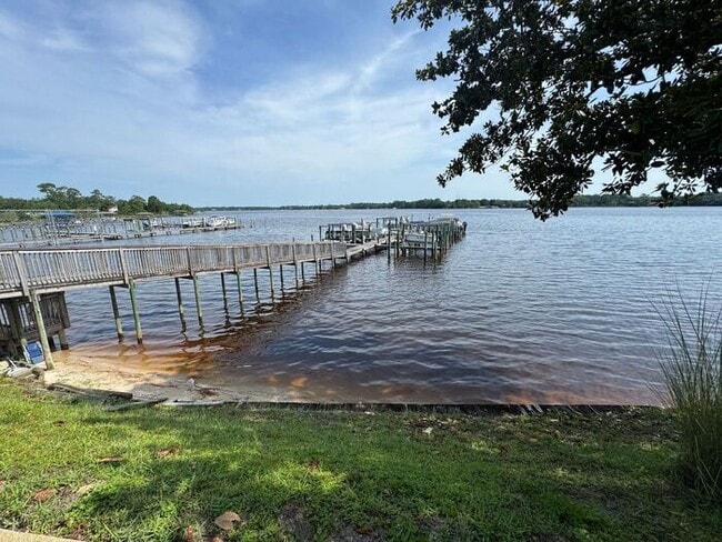 Building Photo - Navarre - Hidden Bay Village - 3 bedroom, 3 bathroom - Waterfront Townhome