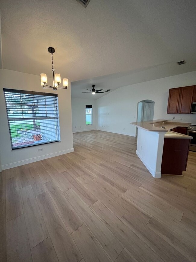 Building Photo - Convenient 3/2/2 PSL Home with Backyard Oa...