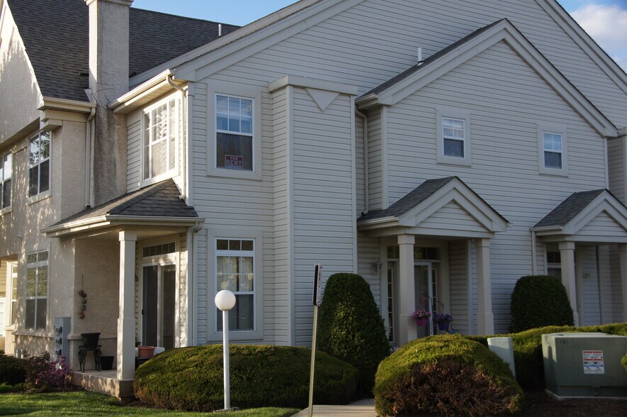 End unit, former model home - 202 Dresher Woods Drive
