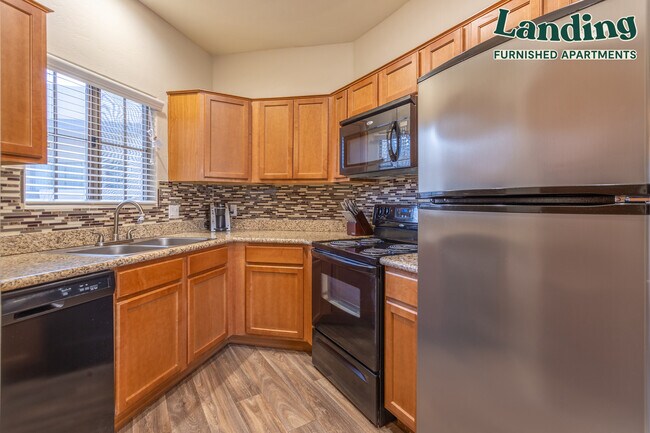 Building Photo - 9259 E Raintree Dr