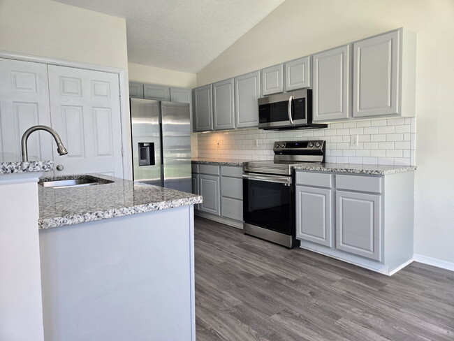 Building Photo - A home that exudes Warmth and Style
