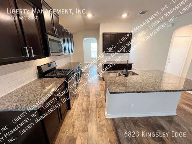 Building Photo - 6823 Kingsley Edge