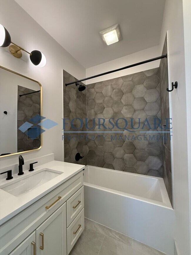 Building Photo - Modern 4-Bed Townhome with Designer Finishes, Dual Balconies & EV-Ready Garage – Inside the Beltl...