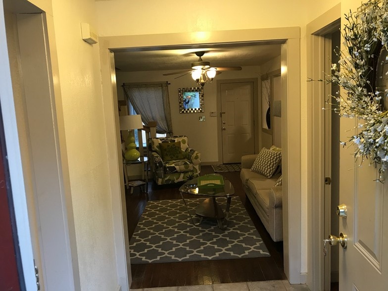 Leaving Cottage via the courtyard-view of LR - 541 E Jones Ln