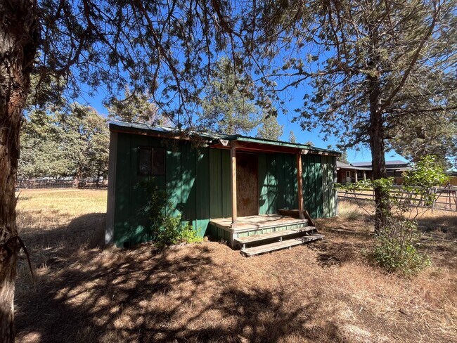 Building Photo - Custom Rustic 4-Bdr on beautiful 5 acres with Greenhouse in Sisters!
