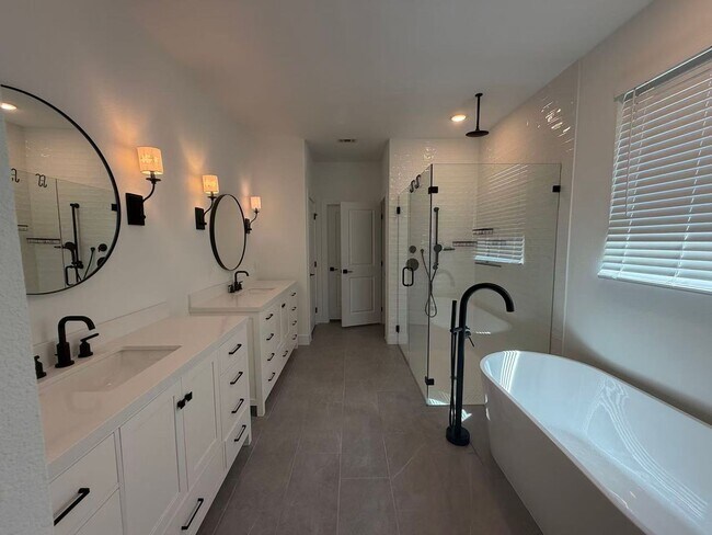 Building Photo - Move-in ready and like-new! Washer, dryer, and refrigerator Included.