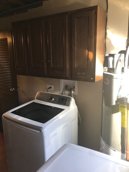 New Washer and storage cabinets. - 512 Carlyle Ln