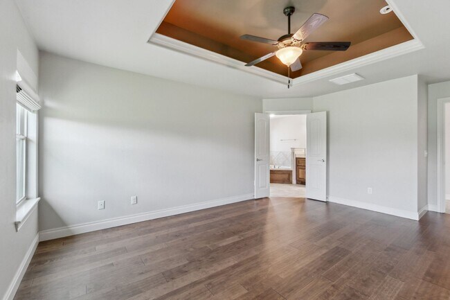 Building Photo - Upscale Comfort Meets Everyday Functionality in This Stunning 3-Car Garage Home!