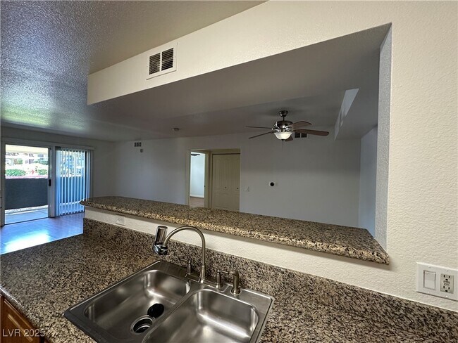 Building Photo - 5055 W Hacienda Ave