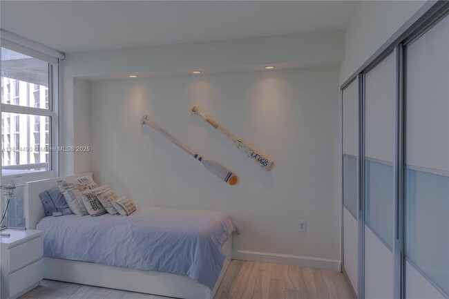 Building Photo - 10275 Collins Ave