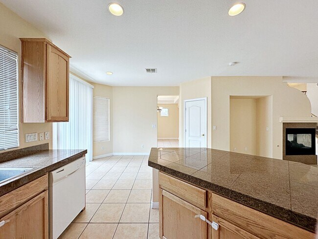 Building Photo - 4 BEDROOM HOME 3 CAR GARAGE ON A CORNER LO...