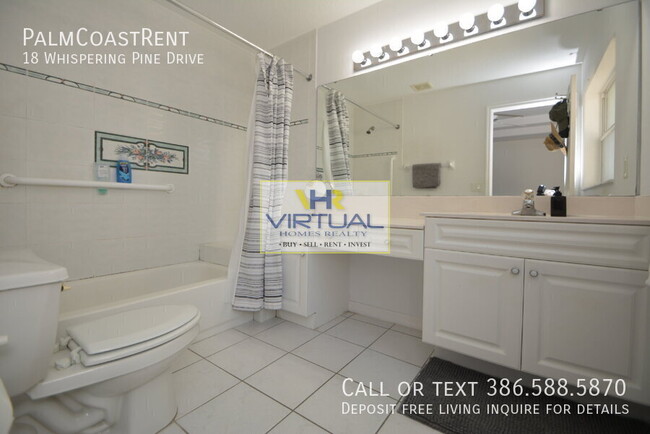 Building Photo - 18 Whispering Pine Dr