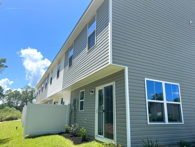Building Photo - New Three-Bedroom, Two and one-half Bath T...