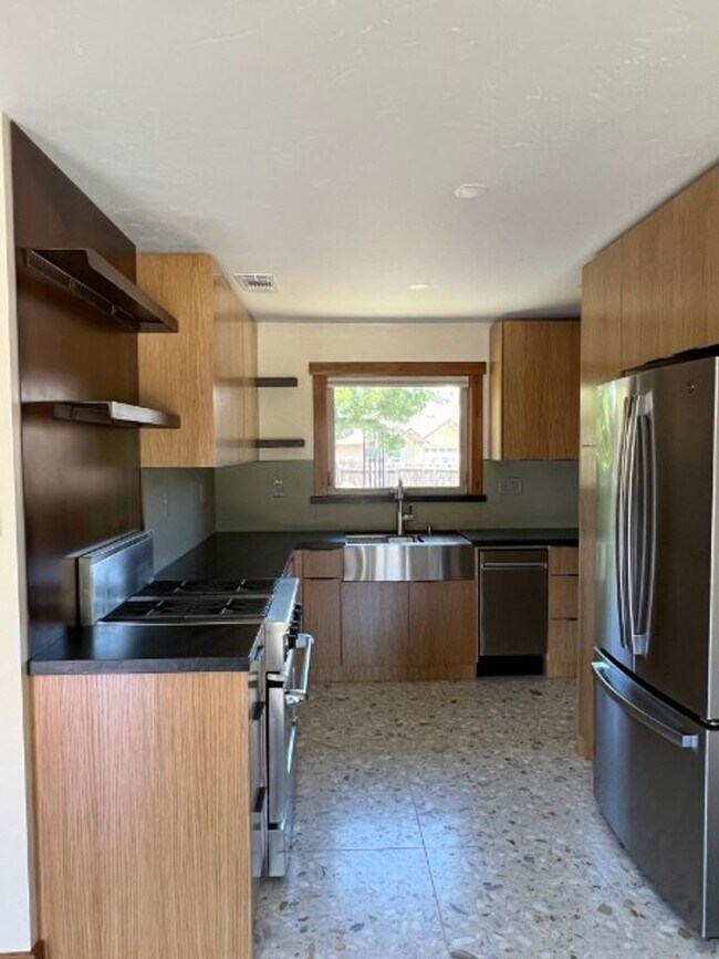 Building Photo - Artisan-Built Custom Cottage Retreat | Private Yard, Garage & EV Charging Ready