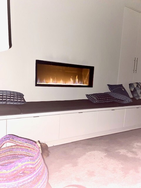 Living room fireplace. - 1730 N Franklin Pl