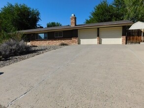 Building Photo - REDUCED - Home in Paradise Hills Sub-Division