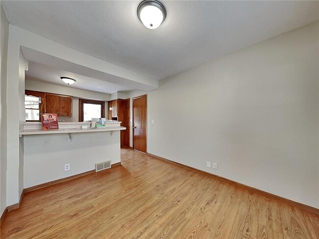 Building Photo - 3405 Ensign Ave N