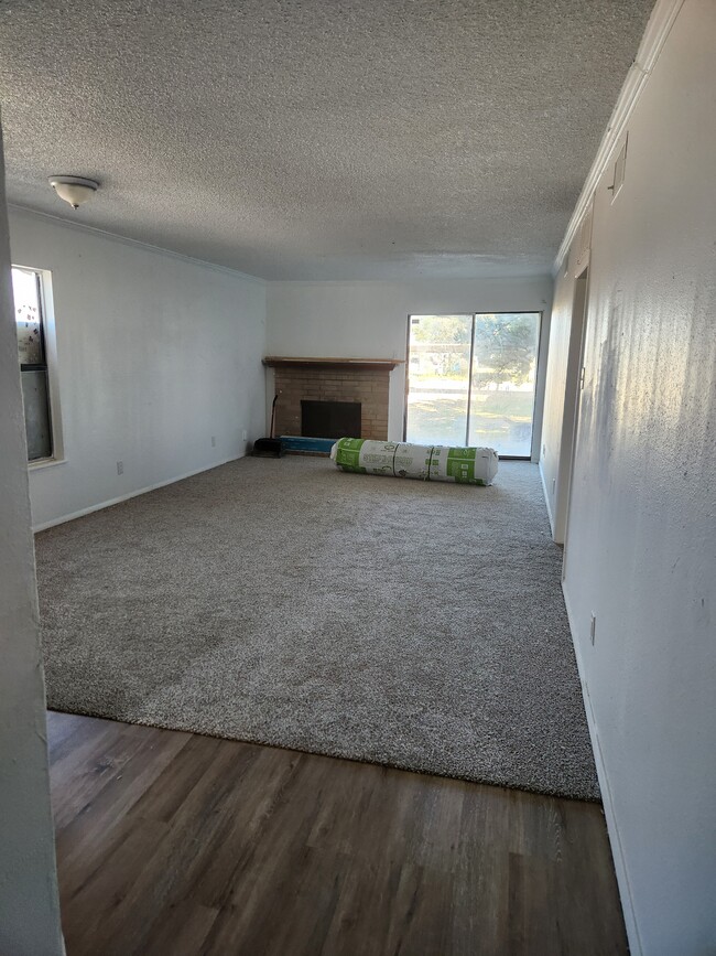 Living area with Fireplace - 7408 Avenue X