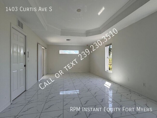 Building Photo - 1403 Curtis Ave S