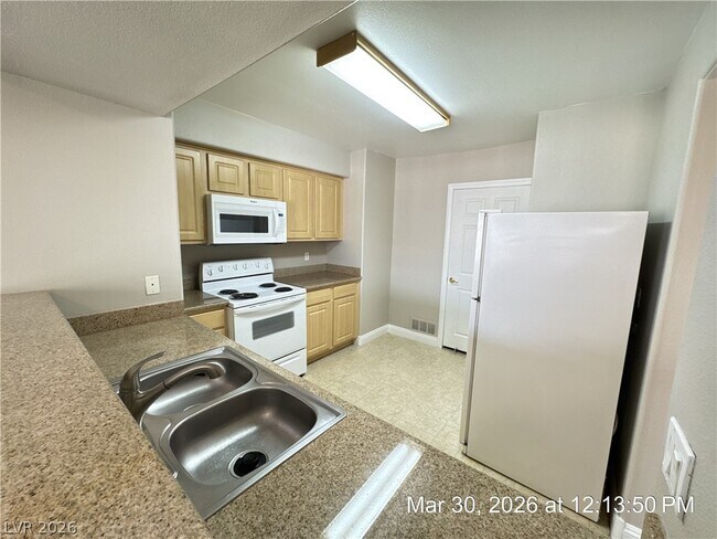 Building Photo - 8000 W Badura Ave