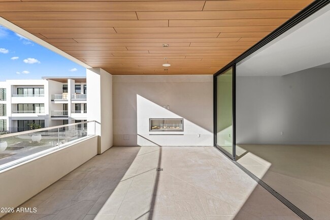 Building Photo - 6587 N Palmeraie Blvd