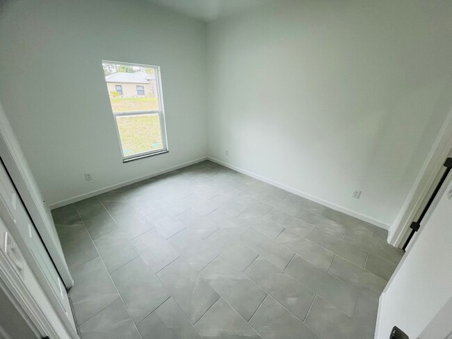 Building Photo - BRAND NEW CONSTRUCTION- ONE OF A KIND-ONE BEDROOM, ONE BATH-ONE CAR GARAGE- LEHIGH ACRES