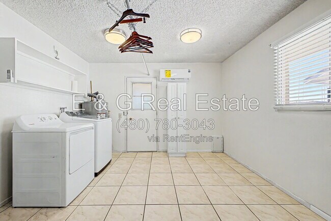 Building Photo - 9847 W Wrangler Dr