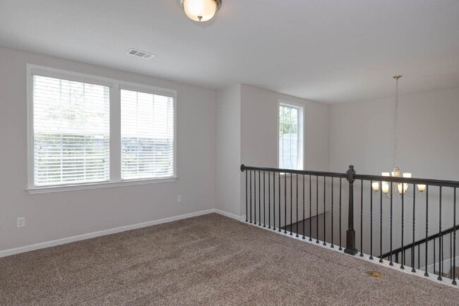 Building Photo - 4BR/3.5BA · 2,809 SF · Owner's Suite on Main · Fenced Yard · Midland, GA — $2,800/mo