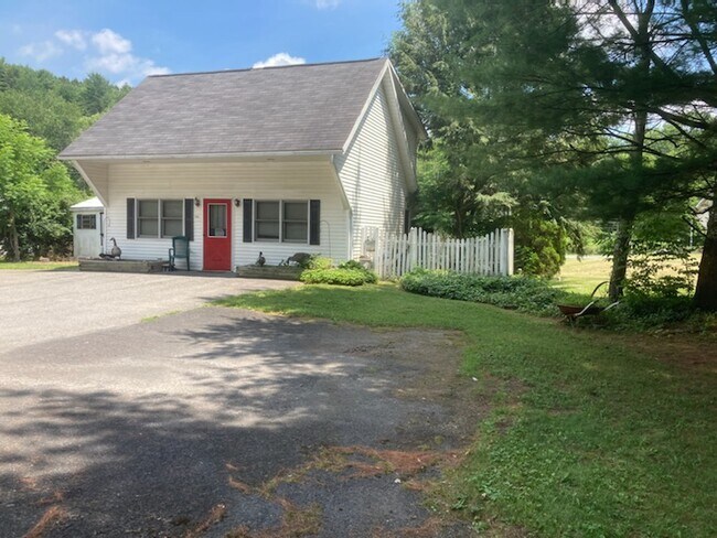 Front Entry & Reserved Car Pad - 320 Valley Rd