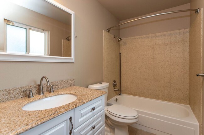 Building Photo - Comfortable Ranch-Style Living with Large Fenced Backyard!