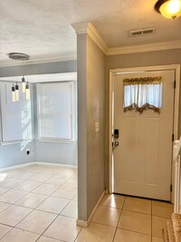 Building Photo - Spacious end unit townhome with first floo...