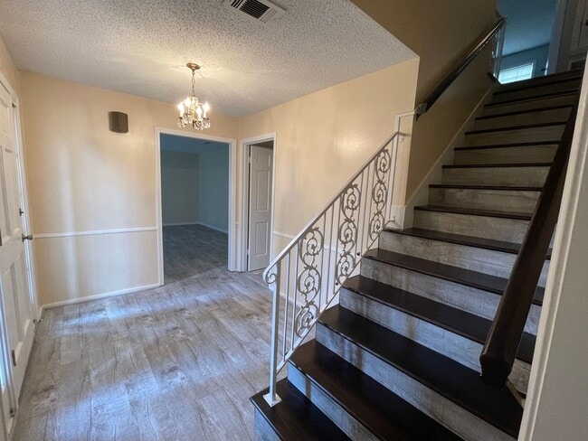 Building Photo - Lovely Two-Story Brick Home Located In "Western Hills" Off Pines Road