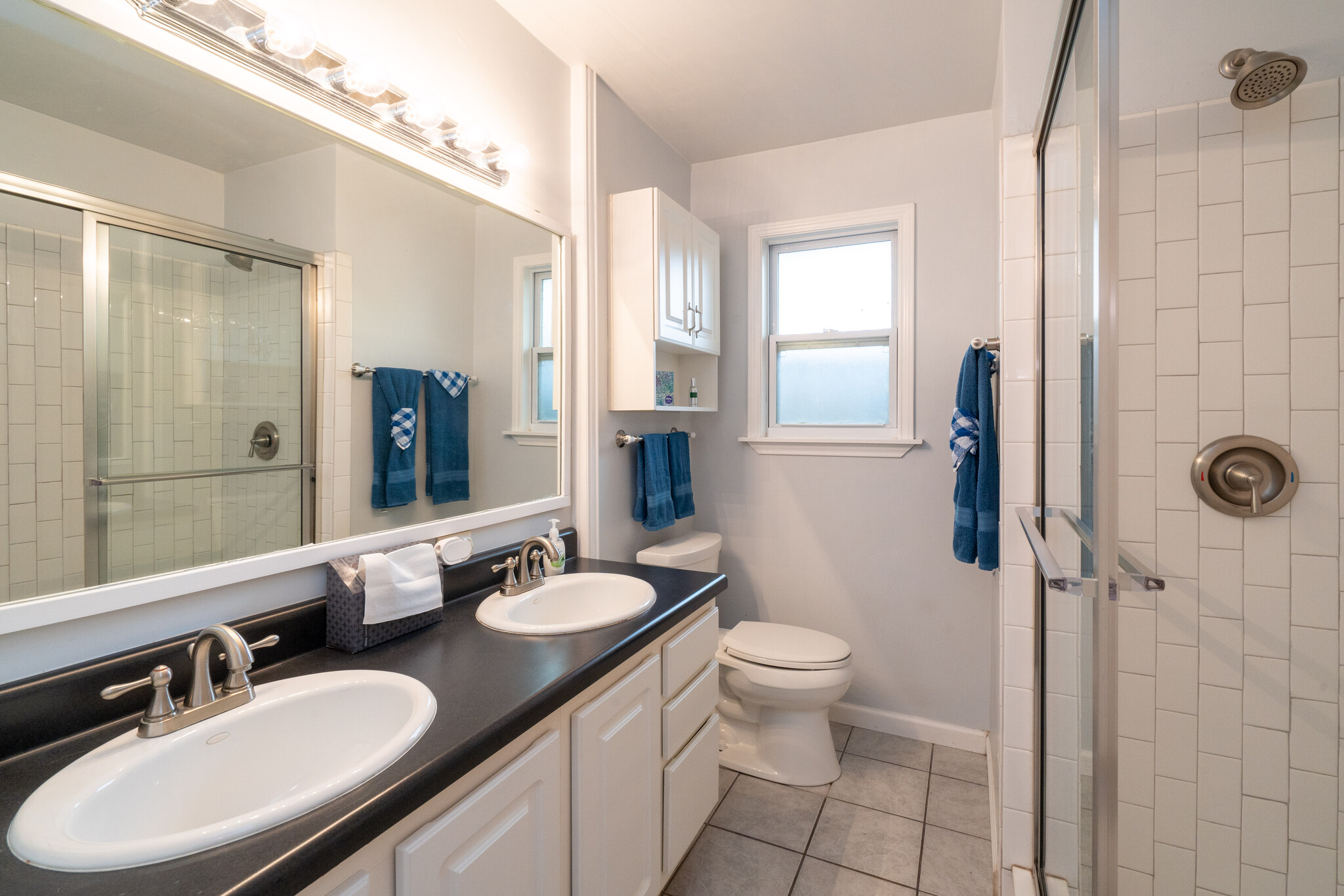 Double sinks, stand up shower with bench seat - 4419 A Gillis