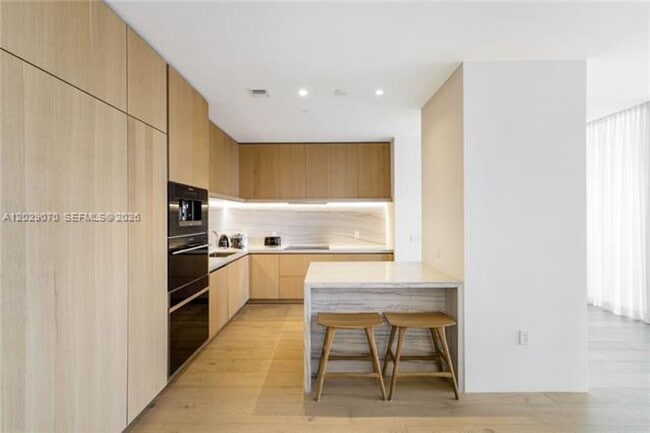 Building Photo - 8701 Collins Ave