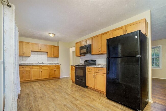 Building Photo - 6095 Mincey Rd