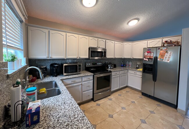 Building Photo - Beautifully Remodeled 5-Bedroom Home with Finished Basement and Custom Upgrades!