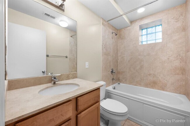 Building Photo - Updated Duplex Condo with 2 parking spots