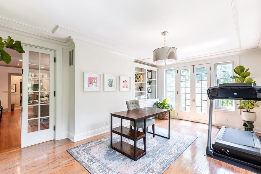 4 Season built in cabinetry. French doors opens to gardens and parking. - 4061 Beechwood Ave