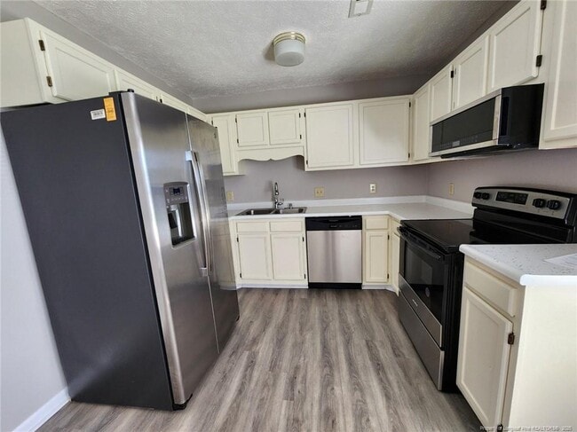 Building Photo - 2908 Rosemeade Dr