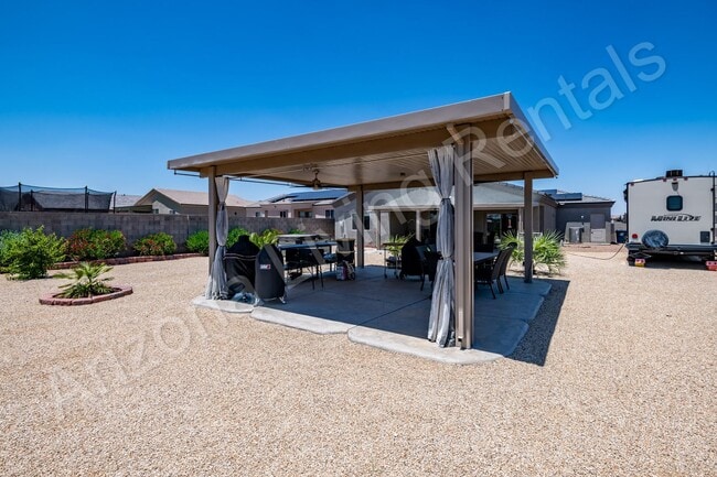 Building Photo - INVITING BACKYARD OASIS