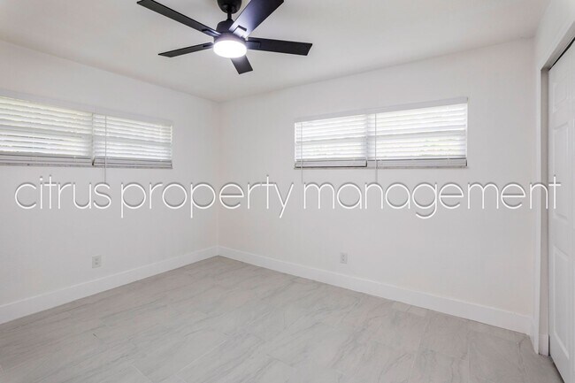 Building Photo - Impeccable, Fully Remodeled 3/2 with Huge Bonus Room Convenient to UCF!