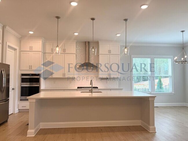Building Photo - Elegant 4-Bed / 3.5-Bath Home with Main-Level Primary Suite, Quartz Kitchen & 3-Car Garage – In H...