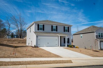 Building Photo - Graham Rental with Open Layout, Den, and 2...