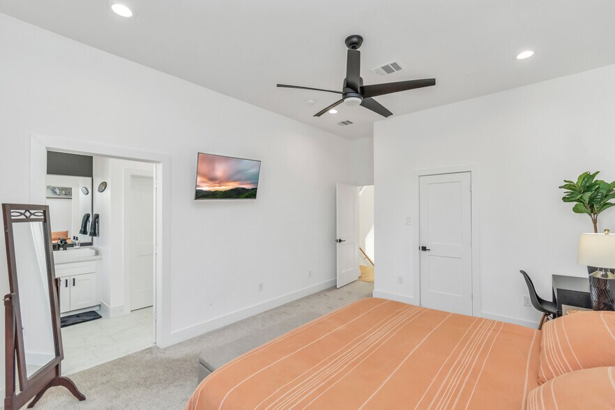 Primary Bedroom on 3rd Floor with two private closets and en-suite bathroom - 1815 Elite Dr