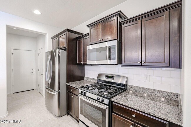 Building Photo - 10398 W Rosewood Ln