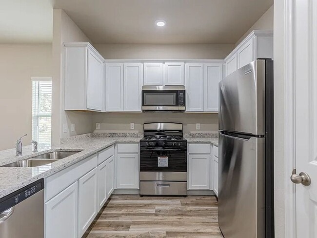 Building Photo - **Discover Elevated Living at Hunters Ranch!**