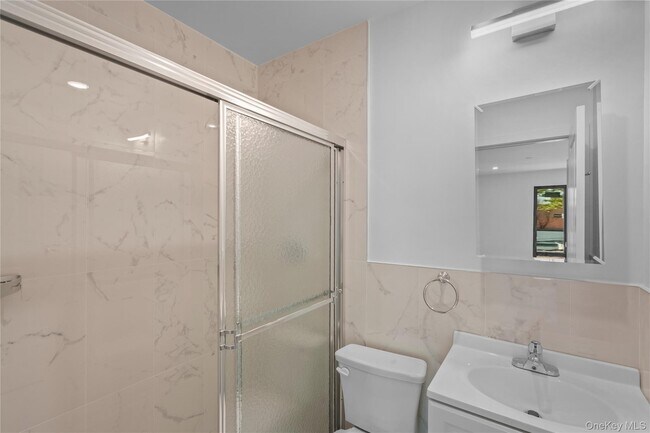 Building Photo - 213-41 38th Ave