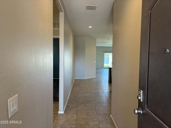 Building Photo - 25698 W Desert Dr