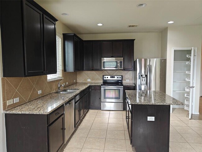 Building Photo - 5610 Hopkins Dr