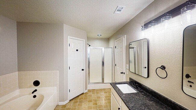 Building Photo - Charming 4-Bedroom Spacious Full-Brick Home with Modern Updates